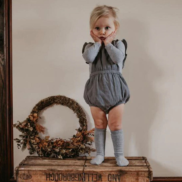 The Ruffle Romper - Lead Gray